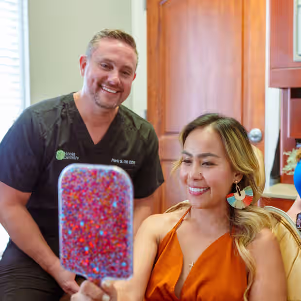 Halls Family Dentistry doctor and patient smiling